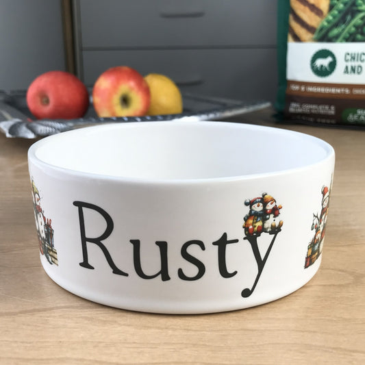 White personalized dog bowl with snowman images.