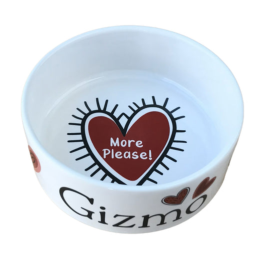 white glossy personalized dog bowl with red hearts and "more please" message in center of bowl